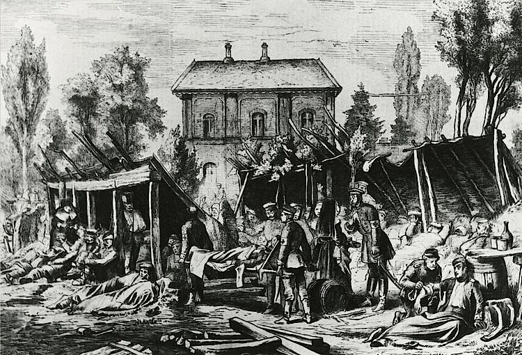 Auf einem Verbandsplatz in Frankreich werden verwundete Soldaten provisorisch verarztet (DRK)